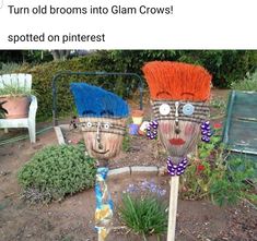 three decorative garden urns sitting in the middle of a yard