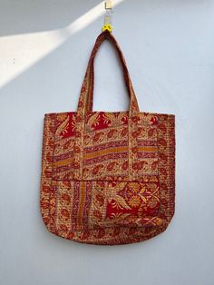 Our vintage Kantha Stitch bags are a perfect combination of style.Each bag is made from upcycled vintage Indian saris.No two piece are alike, this is the beauty of these pieces. Item details : Silk Printed Shoulder Bag Material : Silk Size- 18 X 17 Inches Belt - 26 Inches Wash Care-Normal Hand Wash In Cold Water Indian Saris, Silk Gifts, Silk Bag, Kantha Stitch, Women Bags Fashion, Vintage Indian, Vintage Kantha, Quilted Bag, Upcycled Vintage