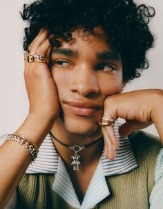 a close up of a person wearing bracelets