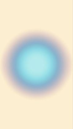 a blurry image of a blue circle in the middle of a light beige background