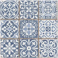 blue and white tiles with different designs