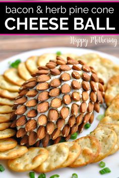 bacon and herb pine cone cheeseball on a plate with crackers