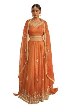 Orange lehenga with zardozi embroidered floral and bird motifs. Comes with matching blouse and gota lace embellished dupatta. - Aza Fashions Silk Lehenga With Resham Embroidery In Orange, Orange Silk Lehenga With Resham Embroidery, Traditional Orange Organza Choli, Orange Organza Sets With Resham Embroidery, Orange Lehenga With Sheer Dupatta, Orange Organza Lehenga For Wedding, Traditional Orange Organza Sets, Orange Chanderi Wedding Sets, Orange Traditional Wear With Sheer Dupatta For Reception