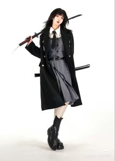 a woman with two swords standing in front of a white background wearing a long black coat