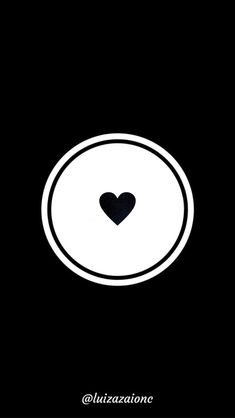 a black and white photo with a heart in the center, on a dark background