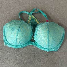 Victoria’s Secret Pink Date Lace Racerback Bra Sz 36d Blue Green Lace With Pink And Yellow Lining. Center Front Closure Plunging Neckline Shine Fabric Adjustable Straps Pretty Lace Racerback Imported Nylon/Polyester/Spandex. Brand New With Tags. Never Been Used In Excellent Condition Blue Push-up Bra With Adjustable Straps, Light Blue Push-up Bra, Purple Bralette, Victoria Secret Pink Bras, Vs Bras, Floral Bra, Beautiful Bra, Racerback Bra, Purple Lace