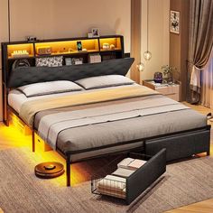 a bed sitting on top of a wooden floor next to a night stand with lights