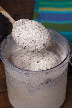 two scoops of ice cream in a glass container