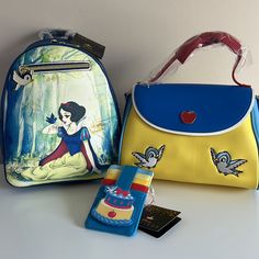 Brand New Loungefly Disney Snow White 3 Pc Bundle. Backpack, Crossbody Bag And Cardholder Set Backpack: Painted-Style Forest Scene Of Snow White And A Bluebird, With A Zippered Pouch And Cute Bird Charm. Adjustable Straps And Red Interior Lining. 8 1/2" X 4" X 10" Polyurethane Crossbody Bag: Polyurethane -Adjustable Blue Shoulder Straps -Debossed, Embroidered, And Printed Details Bag Dimensions: 9.5” W X 7” H X 5” Cardholder: Die-Cut Strap With A Button Closure Polyurethane; Polyester Lining App Disney Yellow Bags For Everyday Use, Disney Yellow School Bag, Yellow Disney School Bag, Multicolor Backpack For Disney Fan Events, Disney Bags For Daily Use And Back To School, Disney Blue Shoulder Bag For Travel, Disney Travel Bags With Detachable Strap, Disney Backpack For Everyday Use, Disney Bags For Everyday Use And Back To School