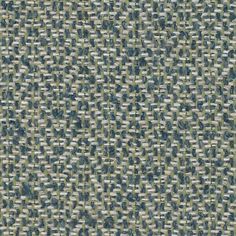 an upholstered fabric pattern in blue and green