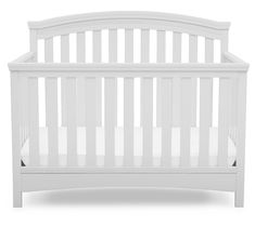 a white crib with no mattress in it