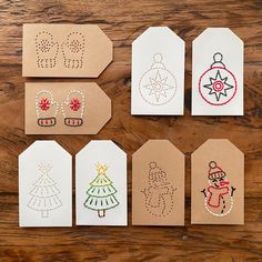 six handmade tags with christmas designs on them