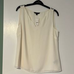 Ivory,, With Beautiful Scallop-Trimmed Detail Elegant White Tank Blouse, Elegant Cream Sleeveless Tank Top, Elegant Cream Sleeveless Top, Elegant Cream Tank Top, Cream Sleeveless Vest For Work, Cream Sleeveless Vest Top, White Tank Top For Work, White Tank Top For Workwear, Brooks Brothers