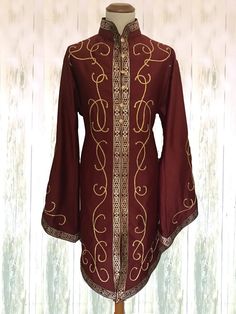 Fitted Long Sleeve Embroidered Kaftan, Elegant Fitted Tunic For Festive Occasions, Fitted Long Sleeve Kurta With Embroidered Cuffs, Elegant Embroidered Fitted Tunic, Fitted Long Sleeve Festive Kaftan, Festive Fitted Kaftan With Gold Embroidery, Embroidered Fitted Tunic Kaftan, Fitted Tunic Kaftan For Festive Occasions, Fitted Long Sleeve Kaftan With Gold Embroidery