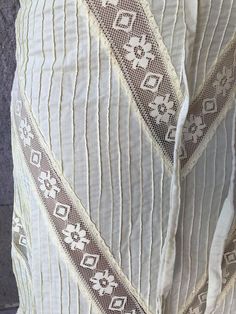 "Very rare Mexican dress, definitely a unique piece. zipper up. Made in 1970's Light Yellow pintuck cotton, you can see through it. Gorgeous details with lace. Fits size Small Measurements taken flat: Armpit to Armpit 18 1/4\" Waist 15\" HIps 19\" Bottom hem width 33 1/2\" Shoulders to bottome hem 50 1/2\"" White Bohemian Maxi Dress With Crochet Trim, Spring Bohemian Maxi Dress With Lace Sleeves, Bohemian Maxi Dress With Lace Sleeves For Spring, Bohemian Wedding Dress With Chikankari Embroidery, Cream Bohemian Dress With Lace Patchwork, Traditional Fitted Lace Maxi Dress, Bohemian Maxi Dress With Lace Trim, Bohemian Long Maxi Dress With Lace Trim, Summer Wedding Maxi Dress With Chikankari Embroidery