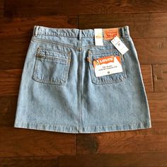 Brand Nwt! Levi's Retro Mini Skirt - Adorable 70's Style Mini With Straight Cut Pockets And Zip Closures. Soft, Light Blue Stonewashed Denim. Designed To Be Worn On Hip. 18" Long. 17.5" Across Top Of Waist (Flat)/21.5" Widest Part Of Hip (Flat). 100% Cotton. Machine Wash Retro High Waist Mini Skirt With Pockets, High Waist Blue Mini Skirt Retro Style, Retro Mini Bottoms With Pockets, Retro Denim Mini Skirt, Retro Mini Skort With Pockets, Vintage Bottoms With Pockets Mini Length, Retro Mini Denim Skirt With Pockets, Vintage Mini Length Bottoms With Pockets, Vintage Mini Bottoms With Pockets