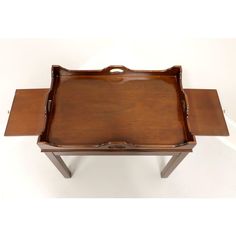 a wooden tray sitting on top of a table