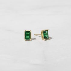 Classic emerald-cut earrings are a staple piece! They look great stacked or by themselves! - - -  D E T A I L S - - -  * Made of 925 Sterling Silver * Thick plating of 14k Gold or Rhodium  * 4x6 mm Stone  * Nickel-free & Hypoallergenic * Sold as a Pair  * Push Back Closure * Emerald Cubic Zirconia Stone - we use the highest grade for an authentic look! Made with 100% Pure Love! ♡ Happy to answer any questions you may have! 🥰 Let's Connect! 🥰 IG: samijewels_ Classic Everyday Earrings For May Birthstone, Baguette Cut Emerald Earrings As A Gift, Emerald Earrings For Everyday May Birthstone, Emerald Earrings For Everyday And May Birthstone, Rectangular Emerald Gemstone Earrings, Rectangular Gemstone Earrings For May Birthstone, Green Baguette Cut Earrings For Gifts, Everyday Green Emerald Earrings, Emerald Rectangular Earrings For May Birthstone