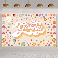 an empty room with flowers and the word grooy painted on it's wall