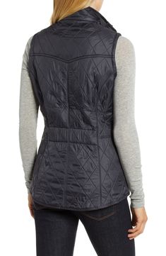 Diamond quilting adds subtle texture to a sleek nylon vest featuring cozy fleece lining and tonal logo embroidery at the pockets. 26 1/2" front length; 29" back length Front zip closure with snap placket Stand collar Dual-entry hand-warmer pockets Fleece lining, with synthetic fill 100% polyamide Machine wash, dry flat Imported Women's Clothing Fitted Quilted Nylon Vest, Quilted Nylon Vest For Fall, Quilted Vest, Diamond Quilt, Logo Embroidery, Merlot, Quilted Jacket, Embroidery Logo, Hand Warmers