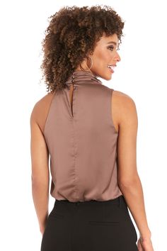 Discover the perfect balance of comfort and style with our Astoria sleeveless turtleneck blouse. This chic separate features a sophisticated high cowl neck and a gently bloused bodice that flatters every figure. Whether you're attending a networking event, enjoying a weekend brunch, or heading to a romantic dinner, the Astoria top adapts effortlessly to any setting. Tuck it into high-waisted trousers for a streamlined look, or let it flow over your favorite jeans for casual elegance. The Astoria Turtleneck Blouse, Office Clothes, Let It Flow, Sleeveless Turtleneck, Romantic Dinner, Weekend Brunch, Networking Event, High Waisted Trousers, Casual Elegance