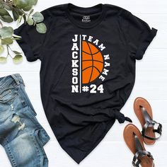 a t - shirt with the name jacks on it and an orange basketball ball