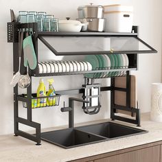 the dish rack is organized with dishes and utensils