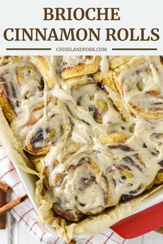 an image of cinnamon rolls in a red casserole dish