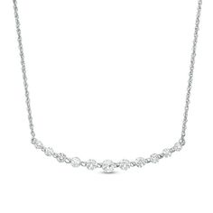 Understated yet elegant, this shimmering fashion necklace easily updates your look. Crafted in cool 10K white gold, this rope chain style is adorned with a row graduating lab-created bright white sapphires - the largest a 4.0mm centre stone. Buffed to a brilliant lustre, this glittering 18.0-inch necklace secures with a spring-ring clasp. White Sapphire Necklace, Peoples Jewellers, Sapphire Necklace, Sapphire Stone, White Sapphire, Rope Chain, White Metal, Necklace Designs, Chain Styles