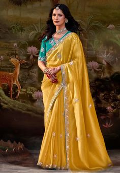 Yellow organza saree with blouse 5342 Desc: Color : Yellow Fabric : Organza Chiffon Work : Embroidery Sequence Wash Care : Dry clean Sleeve Style : Half Sleeve Long Sleeves : Done only in Custom Stitch Sleeves Lining : Done only in Custom Stitch Bust Size : 32 to 42 Inches Occasion : Festival Diwali Mehendi Ceremonial Vat Purnima Raksha Bandhan Karwa Chauth. With Express Free Shipping Buy Designer Sarees - Indian Party wedding and bridal Yellow organza saree with blouse 534... Sequins Saree, Fancy Fabric, Fancy Wedding, Latest Sarees, Fancy Blouses, Embroidered Wedding, Organza Saree, Fancy Sarees, Bollywood Saree