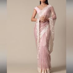 This Piece Is A Saree. Comes With Stitched Blouse . It Is Size 36 Which Is Medium In Women . It Is Not Pre Stitched . Fabric .Satin . Very Light Weight And Beautiful Saree. Wore Just For An Hour For Nikkah / Wedding .Comes With Pink Peticoat. Formal Saree With Resham Embroidery For Navratri, Elegant Organza Blouse For Navratri, Elegant Chanderi Pre-draped Saree, Formal Saree With Resham Embroidery, Formal Blouse With Sheer Dupatta For Festive Occasions, Formal Festive Blouse With Sheer Dupatta, Formal Fitted Chanderi Blouse Piece, Fitted Cotton Silk Pre-draped Saree, Formal Fitted Pre-draped Chanderi Saree