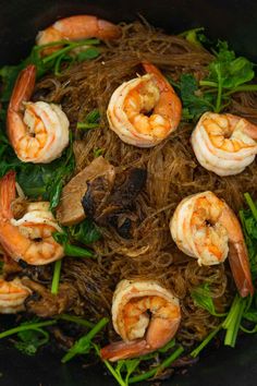 shrimp and noodle stir fry in a wok