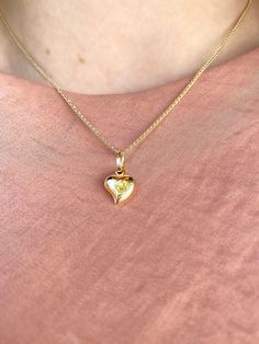 Delight your sweetheart (or yourself) with the gift of this 3D heart pendant made from luxurious 14K Yellow Gold. This pendant suspends from a 16-inch chain that secures with a spring-ring clasp. This style is both simple & striking that can be worn on the daily. Effortlessly chic, a timeless necklace that you can also stack up what your favorites!! Metal: Real 14K Yellow Gold (Stamped) Closure of Necklace: Spring- Ring Clasp Heart Pendant Dimensions: Small: approx. Width: 0.7 Height: 0.9 cm Yellow Gold Heart Necklace With Birthstone For Anniversary, Double Heart Birthstone Necklace In Yellow Gold, Yellow Gold Heart Necklace With Birthstone For Her, Yellow Gold Heart Cut Necklace With Birthstone, Anniversary Yellow Gold Heart Charm Necklace, Yellow Gold Heart Charm Necklace For Anniversary, Yellow Gold Heart Necklace As Gift For Her, Yellow Gold Heart Cut Heart Necklace For Anniversary, Yellow Gold Double Heart Birthstone Necklace