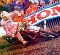 a man riding on the back of a dirt bike