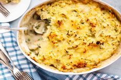 a casserole dish with broccoli and cheese