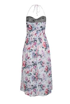 This gorgeous floral midi by Zimmerman is perfect for an afternoon date or brunch with the girls! Featuring a front tie design with a playful cutout and optional halter tie straps, this is a romantic must-have for your wardrobe. Pair with a strappy soft pink sandal and a clutch for a charming look. Size 6 (Zimmerman 1) 100% Cotton Concealed back zipper Halter tie straps Slip pockets Front cutout Pink, blue & purple floral print Bust 28" Waist 42" Length (bust to hem) 41" Zimmerman Patchwork Dress, Zimmerman Floral Applique Dress, Zimmermann Floral Dress, Zimmerman Botanica Dress, Zimmerman Butterfly Dress, White Floral Midi Dress, French Girl Chic, Chic Shop, Tie Design