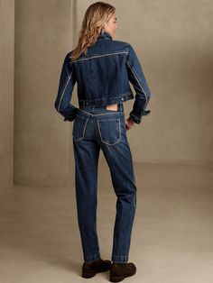 Always ready for adventure, this vintage straight jean is modeled after the classics and cut from a beautiful, dimensional denim accented with vegan leather piping at the pockets and seams.  VINTAGE STRAIGHT FIT: High-waisted and cheeky, these retro- Mid-rise Medium Wash Jeans With Contrast Stitching, Medium Wash Mid-rise Jeans With Contrast Stitching, Trendy Jeans With Contrast Stitching For Fall, Trendy Fall Jeans With Contrast Stitching, Fitted Bottoms With Contrast Stitching For Fall, Spring Cropped Denim Jeans With Contrast Stitching, Fitted Bottoms With Contrast Stitching In Medium Wash, Classic Jeans With Contrast Stitching For Fall, Fitted Jeans With Seam Detailing For Fall