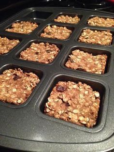 there are many muffins in the pan on the stove top with words above it