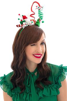 Be the hit of the party wearing this adorable, silly headband! A "Whoville" style design perfect for any Grinch or Cindy Lou Who party. This unique design features a bendable and shapeable spiral that dangles overhead. Includes Christmas tree, gift box, berries, pompoms and a polka dot bow. Color scheme: Red, Green and White. Christmas Headbands Women, Christmas Fascinator, Tacky Christmas Party, Christmas Headpiece, Christmas Party Accessories, Whoville Christmas, Tacky Christmas Sweater, Holiday Headbands, Christmas Hair Accessories