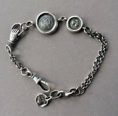 "A lovely sterling silver handmade bracelet in the style of an Antique Albertina chain.... The Albertina is the ladies version of the Albert Watch chain. It is smaller and more decorative than an Albert and mainly worn by Ladies during the Victorian era. Often they are altered and are worn today as beautiful antique bracelets. This is my take on the Albertina using SWALK seals from my collection to personalise it and give it special meaning. This bracelet is not restricted to these two seals and Wax Letter Seal, Letter Seal, Bracelets With Meaning, Antique Wax, Chunky Bracelet, Antique Bracelets, Chunky Bracelets, Knot Bracelet, Watch Chain