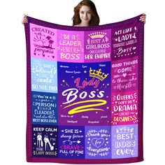 a woman is holding up a blanket with the words boss and princesses on it