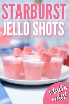 pink jello shots on a white plate with the words, starburst jello shots