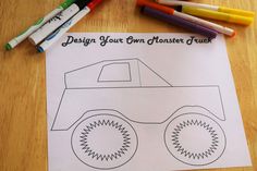 a paper with a car drawn on it next to colored crayons and markers