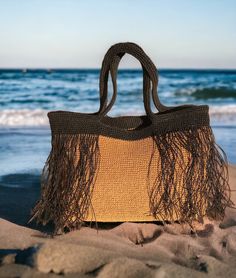 Handmade Summer Tote Bag, Crochet Shoulder Bag, Raffia Tote Bag, Beach Straw Bag, Fringe Tote Bag, Summer Beach Bag, Handmade Gift Any woman must have this bag for every fashionista. Whether you keeping it to yourself or gifting someone you care, it will be unforgettable. ✔️The interior of the straw summer bag has a magnetic button. Suitable for use as shoulder bag, beach bag or party bag. ✔️You can combine your clothes with a straw summer bag on summer days ✔️Bag base is felt supported and does Chic Travel Bag With Fringe, Travel Bags With Fringe And Double Handle, Summer Fringe Bag For Everyday Use, Travel Straw Shoulder Bag With Fringe, Elegant Beach Bag With Top Handle, Travel Shoulder Straw Bag With Fringe, Handheld Handwoven Beach Bags, Handwoven Bags For Beach Season Shopping, Handwoven Shopping Bag For Beach Season