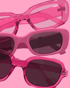 two pairs of pink sunglasses sitting next to each other on top of a pink background