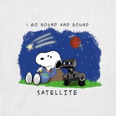 a snoopy dog is sitting on the ground next to a toy car that says, i go round and round satellite