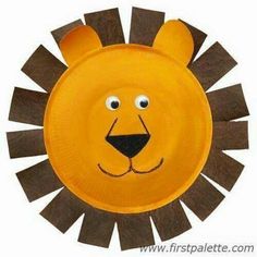 a paper plate with a lion's head cut out to look like it is painted