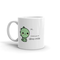 a white coffee mug with the words, i think you're dino - mite