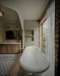 a bath tub sitting in the middle of a bathroom next to a sink and window