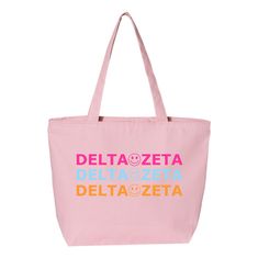 a pink tote bag with the words deltazeta and smiley face on it